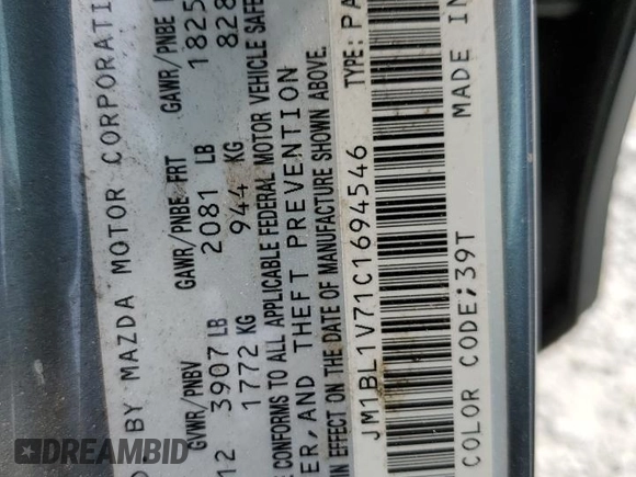 2012 Mazda 3 i Touring with VIN JM1BL1V71C1694546, listed as a Copart auction lot 55103025 with 148,810 mi miles and Salvage title. Bid and sale history available at DreamBid. Image 12.