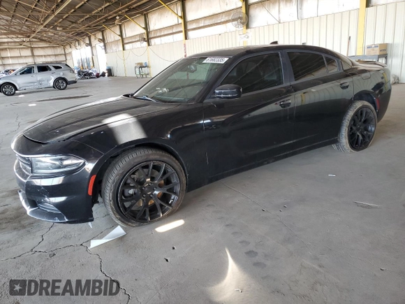 2015 Dodge Charger SXT with VIN 2C3CDXJG9FH748809, listed as a Copart auction lot 61682335 with 128,252 mi miles and Salvage title. Bid and sale history available at DreamBid. Image 1.