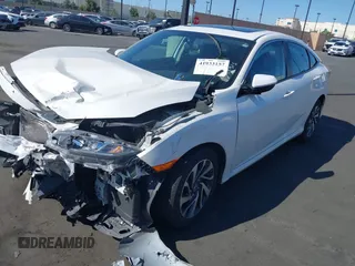 2018 Honda Civic EX with VIN 2HGFC2F71JH502564, listed as a IAAI auction lot 41933157 with 56,696 mi miles and . Bid and sale history available at DreamBid. Image 18.