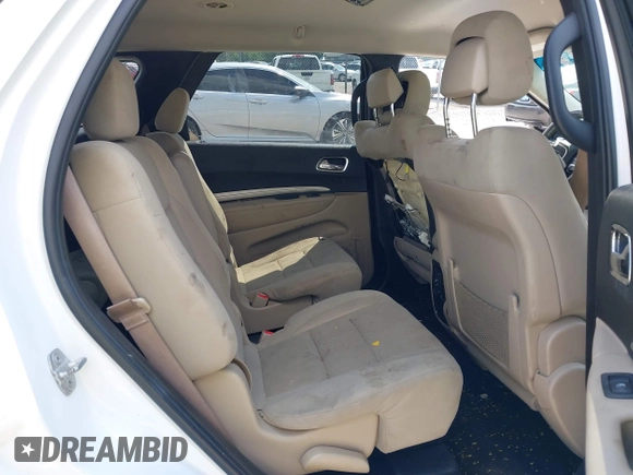 2014 Dodge Durango SXT with VIN 1C4RDHAG9EC313429, listed as a IAAI auction lot 42470331 with 182,635 mi miles and . Bid and sale history available at DreamBid. Image 8.