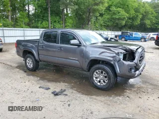 2018 Toyota Tacoma SR5 с VIN 5TFAZ5CN3JX071474, выставлен на аукционе Copart как лот 54677335 с пробегом 86 866 миль миль и Списание • Salvage title. История ставок и продаж доступна на DreamBid. Изображение 4.