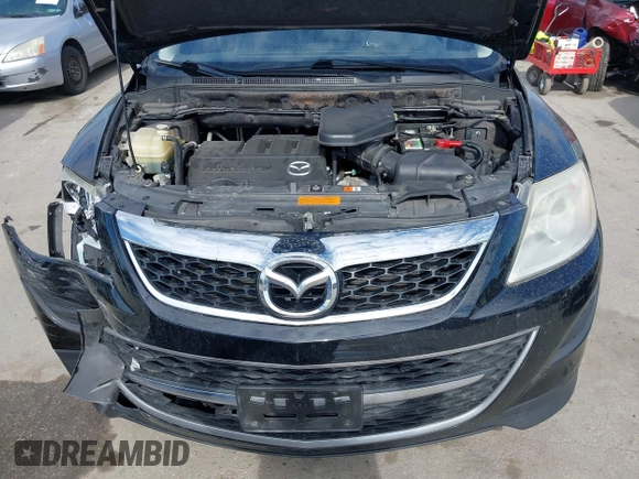 2012 Mazda CX-9 Touring z VIN JM3TB3CV6C0369022, wystawiony jako IAAI lot #41895225 z przebiegiem 137 883 mil mil oraz . Historia ofert i sprzedaży dostępna na DreamBid. Obrazek 10.