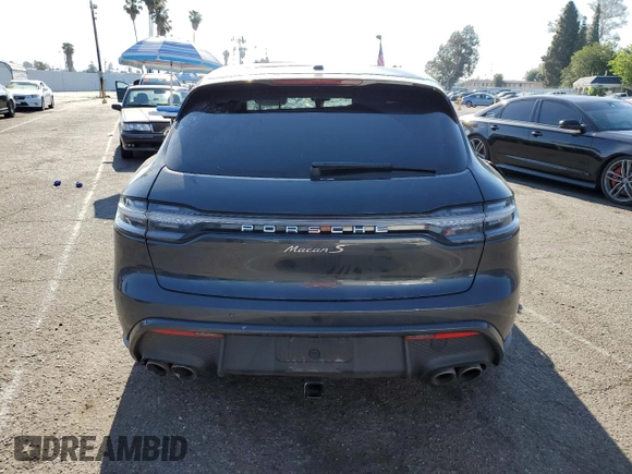 2023 Porsche Macan S z VIN WP1AG2A58PLB40570, wystawiony jako Copart lot #54801095 z przebiegiem Nie podano mil oraz Szkoda całkowita • Salvage title. Historia ofert i sprzedaży dostępna na DreamBid. Obrazek 6.