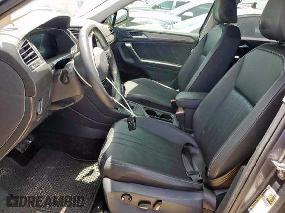 2024 Volkswagen Tiguan SE with VIN 3VV3B7AX4RM061942, listed as a Copart auction lot 61206695 with 27,128 mi miles and Salvage title. Bid and sale history available at DreamBid. Image 7.