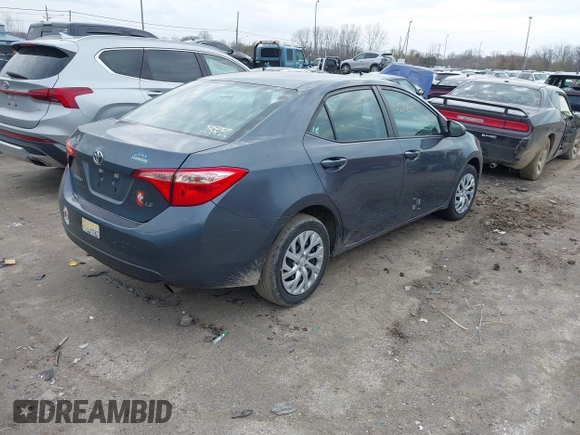 2019 Toyota Corolla L with VIN 5YFBURHE6KP934951, listed as a IAAI auction lot 42000940 with 92,794 mi miles and . Bid and sale history available at carsss.com. Image 4.