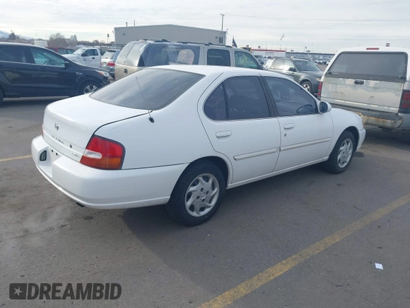 1999 Nissan Altima XE with VIN 1N4DL01DXXC189667, listed as a IAAI auction lot 41715276 with 132,425 mi miles. Bid and sale history available at carsss.com. Image 4.