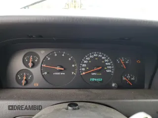 2000 Jeep Grand Cherokee Laredo with VIN 1J4GW48S2YC336733, listed as a Copart auction lot 54553315 with 284,402 mi miles and Non repairable. Bid and sale history available at DreamBid. Image 9.