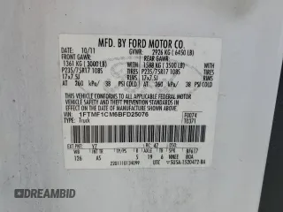 2011 Ford F-150 XL with VIN 1FTMF1CM6BFD25076, listed as a Copart auction lot 50706195 with 249,597 mi miles and Salvage Title. Bid and sale history available at DreamBid. Image 12.