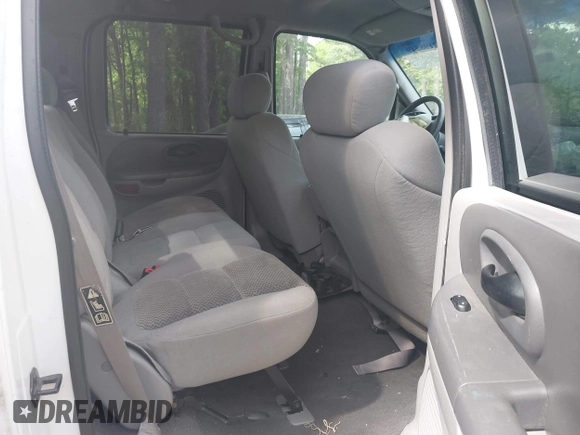 2003 Ford F-150 XLT with VIN 1FTRW07663KD69809, listed as a IAAI auction lot 42198549 with 166,466 mi miles and . Bid and sale history available at DreamBid. Image 8.