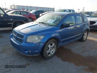 2007 Dodge Caliber SXT with VIN 1B3HB48B67D224890, listed as a IAAI auction lot 41882513 with 223,404 mi miles and . Bid and sale history available at DreamBid. Image 2.