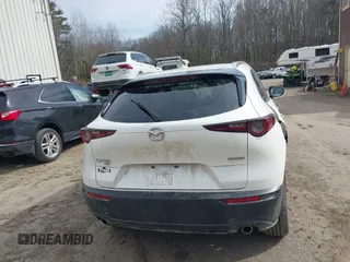 2021 Mazda CX-30 Premium with VIN 3MVDMBDM8MM216520, listed as a IAAI auction lot 41848596 with 60,353 mi miles and . Bid and sale history available at DreamBid. Image 16.