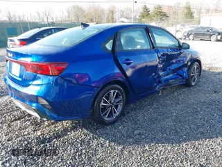 2022 Kia Forte LXS z VIN 3KPF24AD1NE500860, wystawiony jako IAAI lot #42052343 z przebiegiem 57 302 mil mil oraz . Historia ofert i sprzedaży dostępna na DreamBid. Obrazek 4.