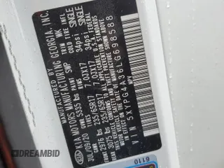2020 Kia Sorento LX z VIN 5XYPG4A36LG698588, wystawiony jako Copart lot #57240045 z przebiegiem 75 298 mil mil oraz Szkoda całkowita • Salvage title. Historia ofert i sprzedaży dostępna na DreamBid. Obrazek 13.