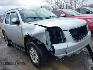 2010 GMC Yukon SLT with VIN 1GKUKCE0XAR286060, listed as a IAAI auction lot 41900285 with 307,912 mi miles. Bid and sale history available at carsss.com. Image 1.