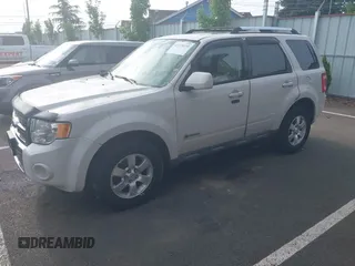 2009 Ford Escape Hybrid with VIN 1FMCU593X9KB70360, listed as a IAAI auction lot 42270239 with 133,658 mi miles and . Bid and sale history available at DreamBid. Image 2.