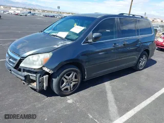 2005 Honda Odyssey EX-L with VIN 5FNRL38735B057514, listed as a IAAI auction lot 41762185 with 264,851 mi miles. Bid and sale history available at carsss.com. Image 2.