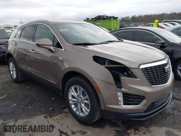 2023 Cadillac XT5 FWD Luxury z VIN 1GYKNAR45PZ140440, wystawiony jako IAAI lot #41723317 z przebiegiem 25 124 mil mil oraz . Historia ofert i sprzedaży dostępna na DreamBid. Obrazek 1.