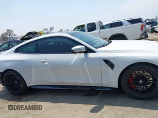 2022 BMW M4 Competition z VIN WBS33AZ04NCJ20752, wystawiony jako IAAI lot #42153801 z przebiegiem 9523 mil mil oraz . Historia ofert i sprzedaży dostępna na DreamBid. Obrazek 14.