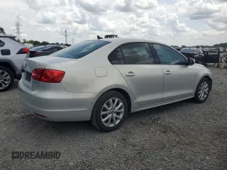 2011 Volkswagen Jetta SE z VIN 3VWDX7AJ0BM319621, wystawiony jako Copart lot #58808615 z przebiegiem 65 829 mil mil oraz Szkoda całkowita • Salvage title. Historia ofert i sprzedaży dostępna na DreamBid. Obrazek 3.