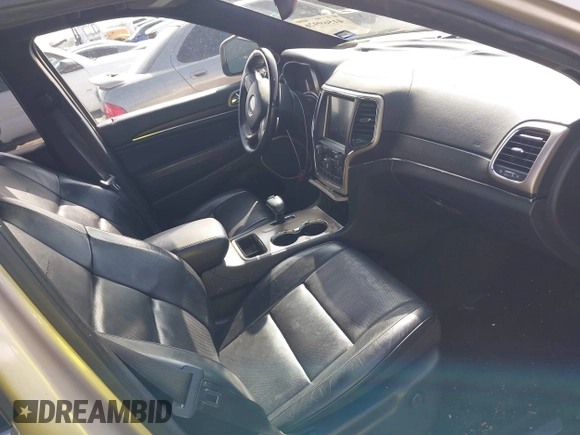 2014 Jeep Grand Cherokee Summit с VIN 1C4RJEJG1EC295063, выставлен на аукционе IAAI как лот 41569926 с пробегом 205 404 миль миль и . История ставок и продаж доступна на DreamBid. Изображение 5.