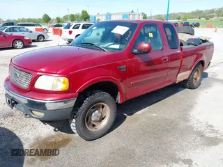 2001 Ford F-150 XL with VIN 1FTRX18L91NB88500, listed as a IAAI auction lot 42096189 with Not provided miles and . Bid and sale history available at DreamBid. Image 2.
