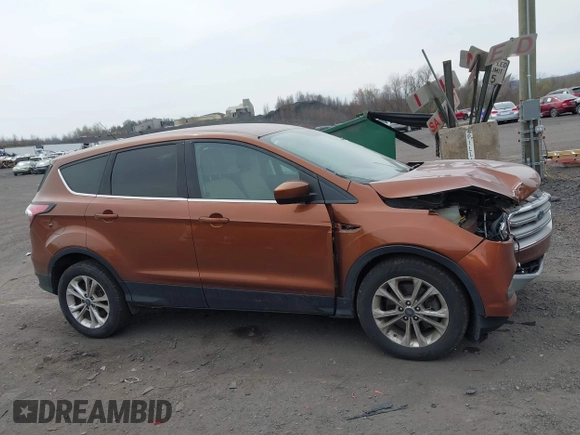 2017 Ford Escape SE with VIN 1FMCU9GD5HUA57132, listed as a IAAI auction lot 42075470 with 106,271 mi miles. Bid and sale history available at carsss.com. Image 13.
