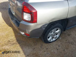 2014 Jeep Compass Sport with VIN 1C4NJCBA9ED594548, listed as a IAAI auction lot 41953586 with 194,593 mi miles. Bid and sale history available at carsss.com. Image 13.