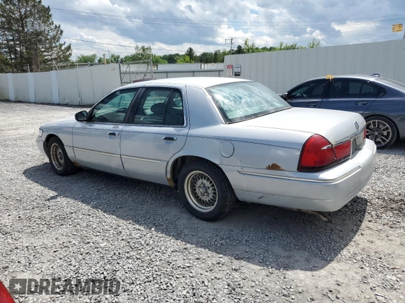 2000 Mercury Grand Marquis LS z VIN 2MEFM75W8YX614309, wystawiony jako Copart lot #61229915 z przebiegiem 228 527 mil mil oraz Szkoda całkowita • Salvage title. Historia ofert i sprzedaży dostępna na DreamBid. Obrazek 2.