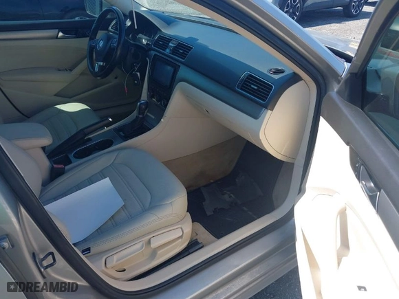2014 Volkswagen Passat TDI SE w/Sunroof with VIN 1VWBN7A34EC099761, listed as a IAAI auction lot 41988242 with 142,861 mi miles. Bid and sale history available at carsss.com. Image 5.