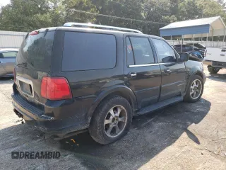 2004 Lincoln Navigator Luxury with VIN 5LMFU27R04LJ12874, listed as a Copart auction lot 76061434 with 243,480 mi miles and Salvage Title. Bid and sale history available at carsss.com. Image 3.