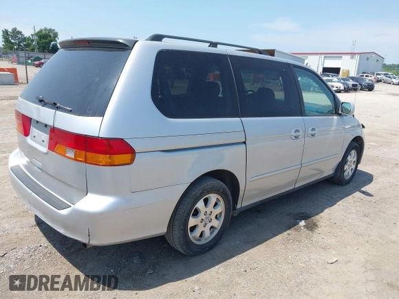 2003 Honda Odyssey EX-L z VIN 5FNRL18053B088851, wystawiony jako IAAI lot #42197114 z przebiegiem 219 456 mil mil oraz . Historia ofert i sprzedaży dostępna na DreamBid. Obrazek 4.
