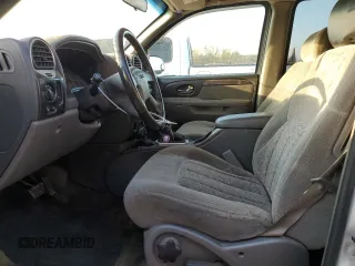 2003 GMC Envoy SLE z VIN 1GKDS13S532369187, wystawiony jako Copart lot #79922934 z przebiegiem 223 997 mil mil oraz Szkoda całkowita • Salvage title. Historia ofert i sprzedaży dostępna na DreamBid. Obrazek 7.