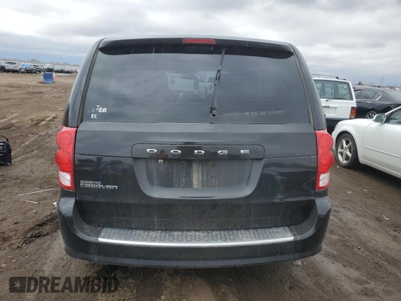 2015 Dodge Grand Caravan SE with VIN 2C4RDGBG7FR516773, listed as a Copart auction lot 52035135 with 132,122 mi miles and Salvage Title. Bid and sale history available at DreamBid. Image 6.
