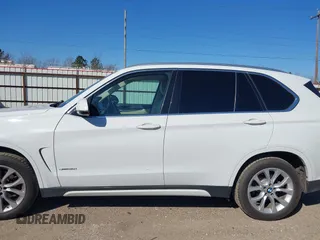 2014 BMW X5 sDrive35i with VIN 5UXKR2C53E0C01692, listed as a IAAI auction lot 41727216 with 135,985 mi miles. Bid and sale history available at carsss.com. Image 14.