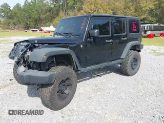 2012 Jeep Wrangler Unlimited Sport with VIN 1C4BJWDG2CL258264, listed as a IAAI auction lot 41880235 with 173,661 mi miles. Bid and sale history available at carsss.com. Image 2.