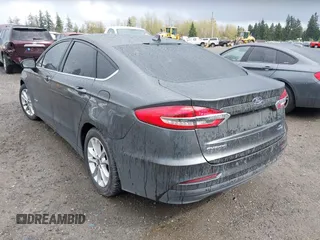 2019 Ford Fusion SE with VIN 3FA6P0LU6KR272193, listed as a IAAI auction lot 41993485 with 132,845 mi miles and . Bid and sale history available at DreamBid. Image 3.