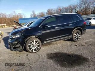 2021 Honda Pilot Touring 8-Passenger with VIN 5FNYF5H94MB039974, listed as a Copart auction lot 82654964 with 54,048 mi miles and Salvage Title. Bid and sale history available at DreamBid. Image 1.