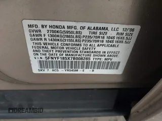 2007 Honda Pilot EX-L with VIN 5FNYF185X7B008285, listed as a IAAI auction lot 41869795 with 238,516 mi miles. Bid and sale history available at carsss.com. Image 9.