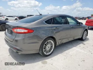 2013 Ford Fusion SE Hybrid with VIN 3FA6P0LU8DR261232, listed as a Copart auction lot 60674105 with 132,901 mi miles and Clean title. Bid and sale history available at DreamBid. Image 3.