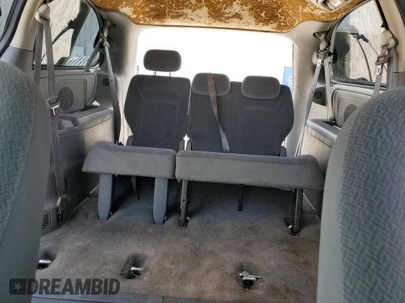 2005 Dodge Caravan SXT z VIN 2D4GP44L15R380469, wystawiony jako Copart lot #58800775 z przebiegiem Nie podano mil oraz Szkoda całkowita • Salvage title. Historia ofert i sprzedaży dostępna na DreamBid. Obrazek 10.