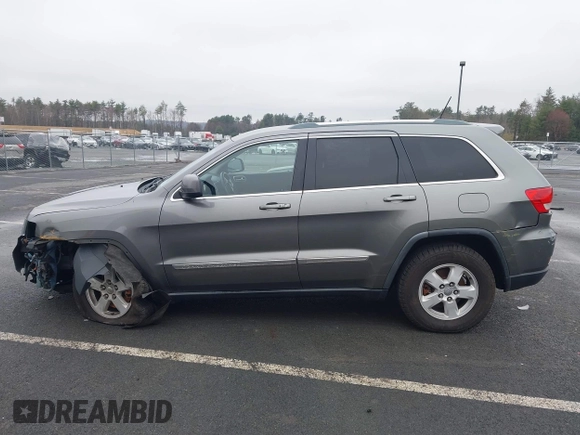 2011 Jeep Grand Cherokee 70th Anniversary with VIN 1J4RR4GG0BC608829, listed as a IAAI auction lot 41960876 with 231,714 mi miles. Bid and sale history available at carsss.com. Image 14.