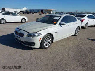 2014 BMW 5 Series 528i with VIN WBA5A5C57ED504582, listed as a IAAI auction lot 41699668 with 113,792 mi miles. Bid and sale history available at carsss.com. Image 2.