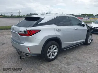 2016 Lexus RX 350 with VIN 2T2ZZMCA1GC006037, listed as a IAAI auction lot 41989511 with 55,071 mi miles. Bid and sale history available at carsss.com. Image 4.