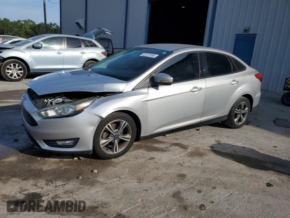 2017 Ford Focus SE with VIN 1FADP3FE9HL273889, listed as a Copart auction lot 53737055 with 114,700 mi miles and Salvage Title. Bid and sale history available at DreamBid. Image 1.