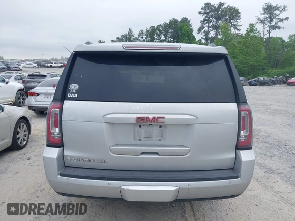 2015 GMC Yukon XL SLT with VIN 1GKS1HKC2FR251672, listed as a IAAI auction lot 42152312 with 232,736 mi miles and . Bid and sale history available at carsss.com. Image 16.