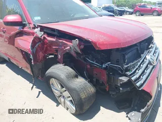 2019 Volkswagen Atlas SE with VIN 1V2UR2CA4KC553905, listed as a IAAI auction lot 42401734 with 71,405 mi miles and . Bid and sale history available at DreamBid. Image 6.