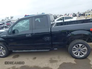 2018 Ford F-150 XL with VIN 1FTEX1EP6JKF59667, listed as a IAAI auction lot 42410311 with 134,385 mi miles and . Bid and sale history available at DreamBid. Image 14.
