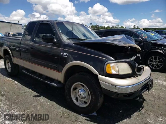 2000 Ford F-150 XL z VIN 1FTRX18L7YNB44005, wystawiony jako Copart lot #56535195 z przebiegiem 187 429 mil mil oraz Szkoda całkowita • Salvage title. Historia ofert i sprzedaży dostępna na DreamBid. Obrazek 13.