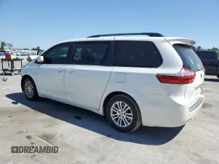 2015 Toyota Sienna XLE with VIN 5TDYK3DC1FS612491, listed as a Copart auction lot 53673815 with 169,306 mi miles and Salvage Title. Bid and sale history available at DreamBid. Image 2.