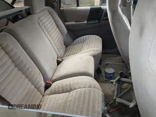 1994 Jeep Grand Cherokee Laredo with VIN 1J4GZ58S9RC215874, listed as a IAAI auction lot 42577378 with 230,824 mi miles and . Bid and sale history available at DreamBid. Image 8.